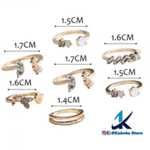 Set de anillos dorado con cristales blancos