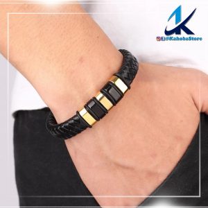 pulsera negra y dorado