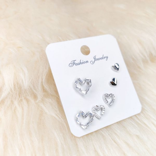 Set de aritos inox plata corazones