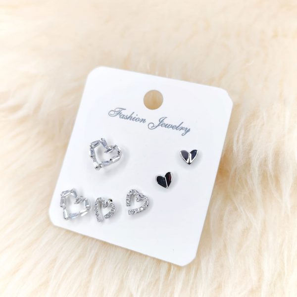 Set de aritos inox plata corazones