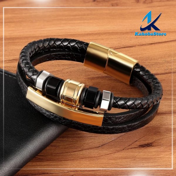 Pulsera de cuero negro con detalles dorado y negro