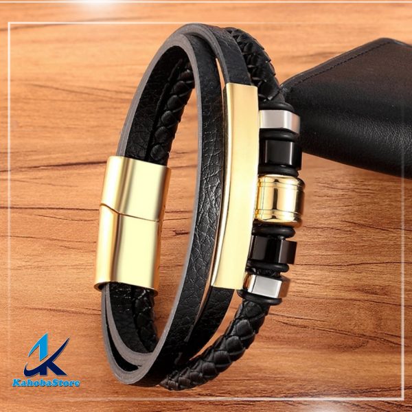 Pulsera de cuero negro con detalles dorado y negro